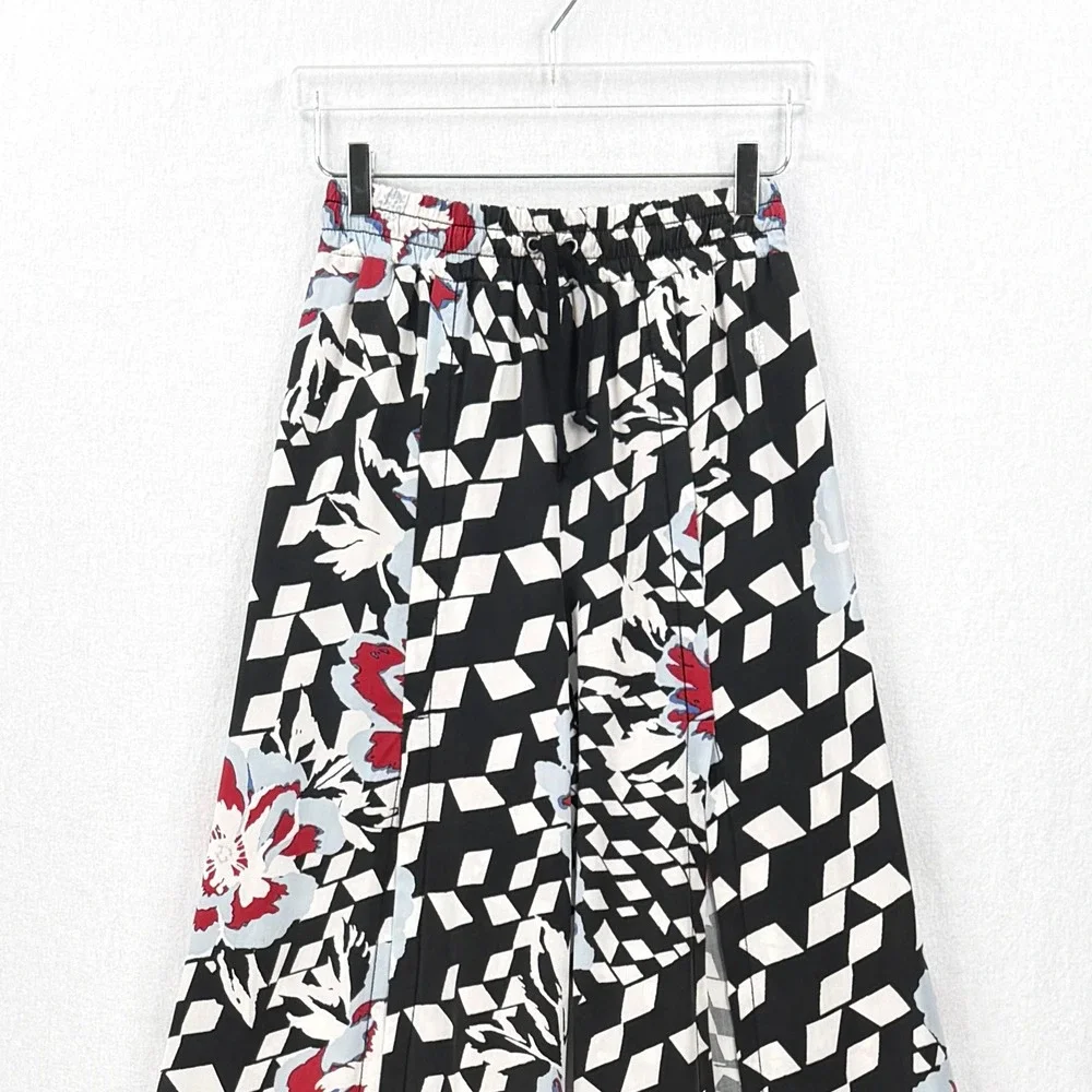 FREE PEOPLE Movement Abs Tracker Slit Hem Pants Women XS Black Floral Wide Leg - Picture 5 of 16
